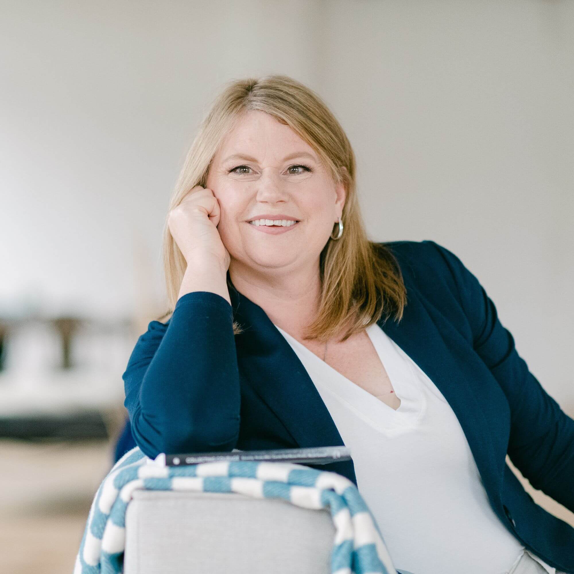 Heather sitting and smiling