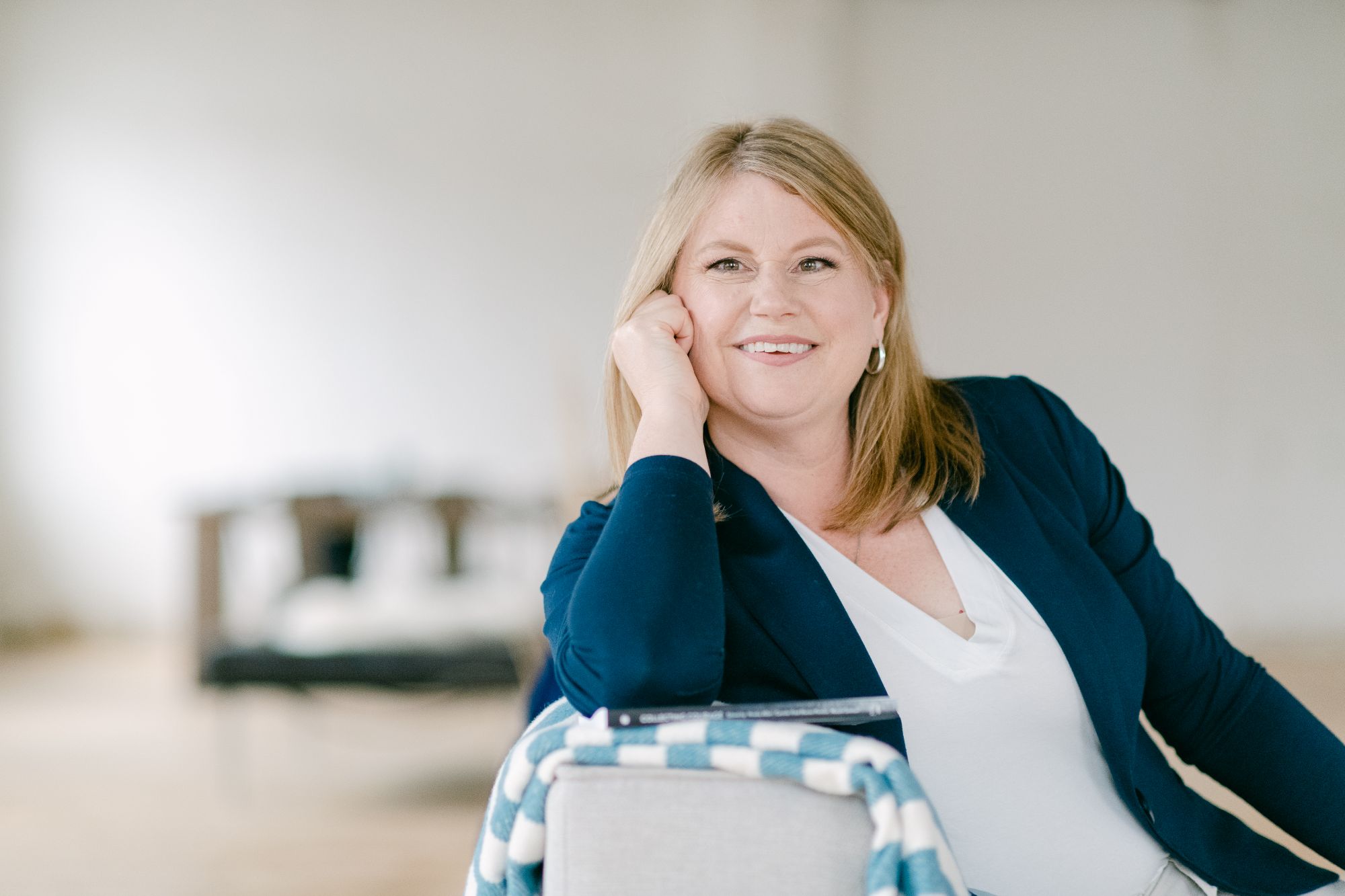 Heather sitting and smiling