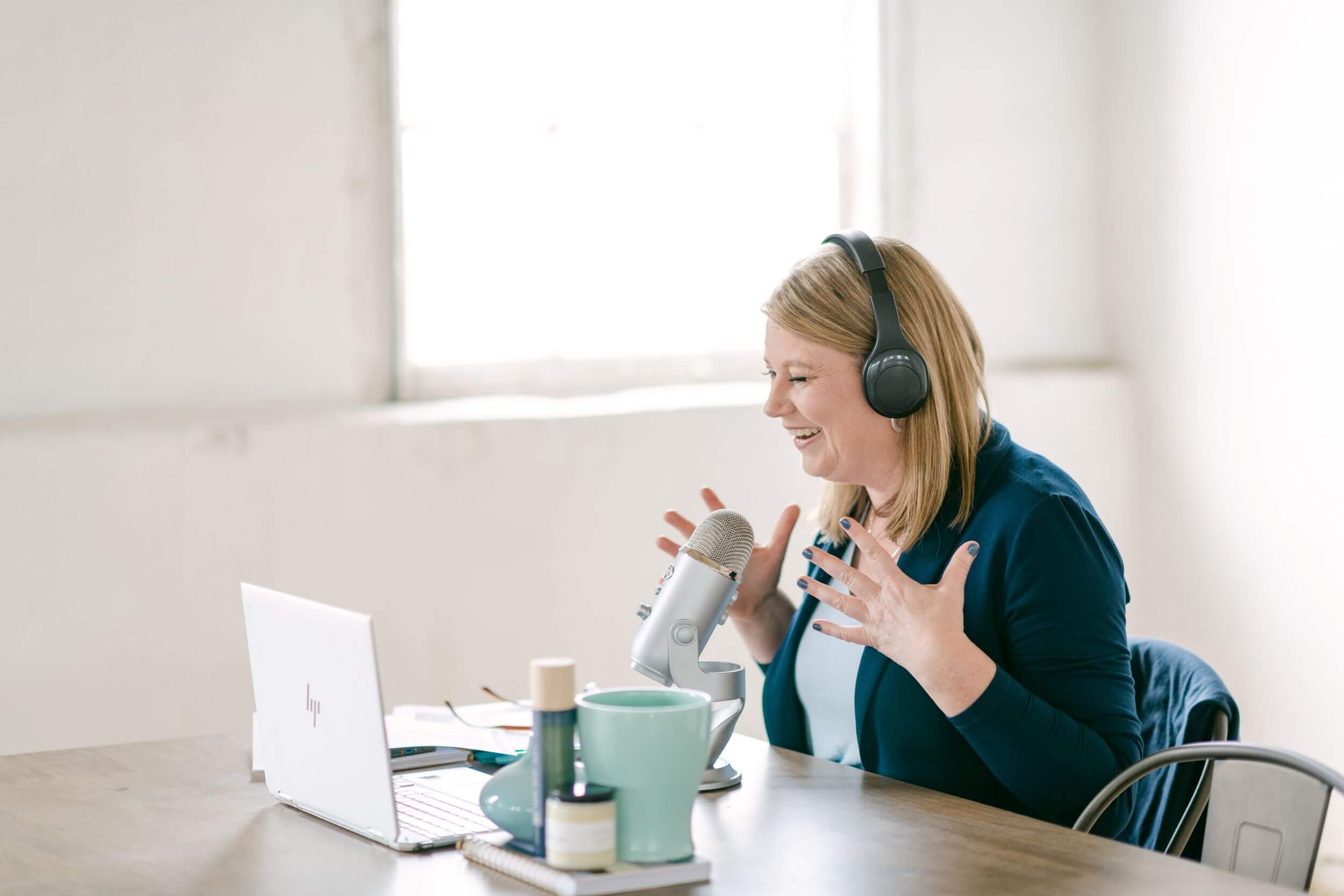 Heather recording a podcast
