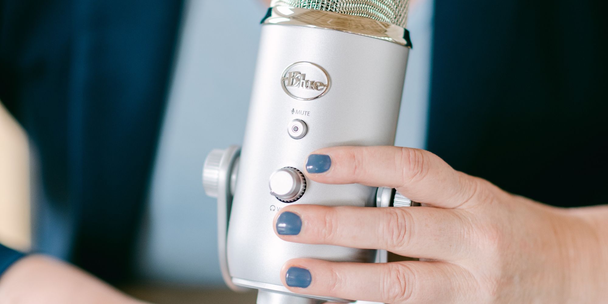 Heather holding a microphone